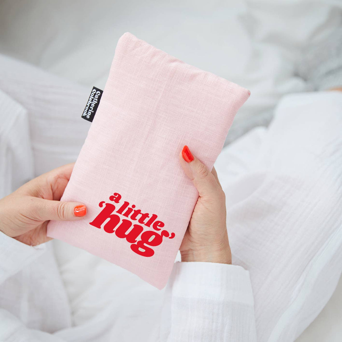 &#39;A Little Hug&#39; Cute Hot Water Bottle: Pink with Red